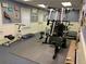 Basement home gym with various exercise equipment at 2631 Gladstone Ter, Woodstock, GA 30189