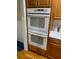 Double wall oven with sleek white finish at 2631 Gladstone Ter, Woodstock, GA 30189