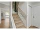 Carpeted staircase leading to the upper level of the home at 6584 Sleepy Hollow Ln, Morrow, GA 30260