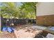 Small backyard with patio and wooden fence at 6584 Sleepy Hollow Ln, Morrow, GA 30260