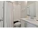 Clean, white bathroom with subway tile, modern fixtures, and a shower/tub combo at 1062 Kirkland Cir, Smyrna, GA 30080