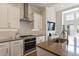 Modern kitchen with stainless steel appliances and white cabinets at 1062 Kirkland Cir, Smyrna, GA 30080