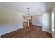 Bright dining room with hardwood floors and a chandelier at 735 Asbury Road, Temple, GA 30179