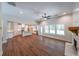 Open living room with kitchen views and fireplace at 735 Asbury Road, Temple, GA 30179