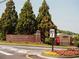The Collection at Forsyth entrance with landscaping and signage at 615 Skytop Dr, Cumming, GA 30040