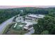 Aerial view of a community center with playground and parking lot at 615 Skytop Dr, Cumming, GA 30040