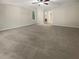 Spacious Primary bedroom with neutral carpeting and ceiling fan at 9997 Point View Dr, Jonesboro, GA 30238