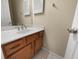 Simple bathroom with wood vanity and single sink at 9997 Point View Dr, Jonesboro, GA 30238