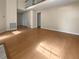 Bright living room featuring hardwood floors and high ceilings at 9997 Point View Dr, Jonesboro, GA 30238