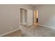 Bright bedroom with carpet and access to bathroom at 200 Etris Grove Ct, Roswell, GA 30075