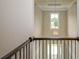 Two-story foyer with chandelier and view from upstairs at 200 Etris Grove Ct, Roswell, GA 30075