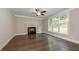 Living room features hardwood floors, fireplace and large windows at 200 Etris Grove Ct, Roswell, GA 30075