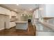 Spacious kitchen with island, granite countertops, and stainless steel appliances at 200 Etris Grove Ct, Roswell, GA 30075