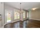 Breakfast nook with hardwood floors and access to backyard at 200 Etris Grove Ct, Roswell, GA 30075