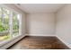 Spacious office with hardwood floors and a large window offering natural light at 200 Etris Grove Ct, Roswell, GA 30075