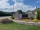 Entrance sign for Ettris Grove community with brickwork and landscaping at 200 Etris Grove Ct, Roswell, GA 30075