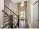 Two story foyer with hardwood floors and a staircase at 200 Etris Grove Ct, Roswell, GA 30075