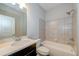 Clean bathroom with a shower/tub combo, toilet and vanity at 200 Etris Grove Ct, Roswell, GA 30075