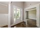 Foyer with hardwood floors, a door and view to office at 200 Etris Grove Ct, Roswell, GA 30075