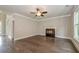 Living room features hardwood floors, fireplace and large windows at 200 Etris Grove Ct, Roswell, GA 30075