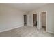 Bedroom with carpet flooring and access to bathroom and closet at 200 Etris Grove Ct, Roswell, GA 30075