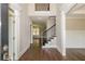 Bright foyer with hardwood floors and a staircase at 200 Etris Grove Ct, Roswell, GA 30075