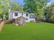 Large backyard with a newly added screened porch and deck at 1161 Appian Way, Lawrenceville, GA 30046