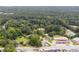Aerial view highlighting lot's location near town and water at 5665 Austell Powder Springs Rd, Austell, GA 30106