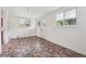 Bright laundry room with tile floor and exterior access at 5665 Austell Powder Springs Rd, Austell, GA 30106