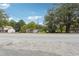 Residential street with a house at 5665 Austell Powder Springs Rd, Austell, GA 30106