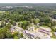 Aerial view showing home situated near a main road and businesses at 5665 Austell Powder Springs Rd, Austell, GA 30106