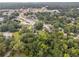 Aerial view showcasing property's location near shops and town at 5665 Austell Powder Springs Rd, Austell, GA 30106