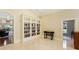 Well-lit library with built-in bookshelves and ample natural light at 3280 Stillhouse Se Ln # 208, Atlanta, GA 30339