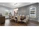 Formal dining room featuring a gray chevron wall and hardwood floors at 3195 Camp Branch Rd, Buford, GA 30519