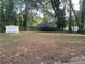 Vacant lot with shed and mature trees at 916 Cascade Sw Rd, Atlanta, GA 30311