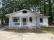 Charming bungalow with front porch and stone columns at 916 Cascade Sw Rd, Atlanta, GA 30311
