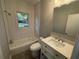 Bathroom with white subway tile and modern vanity at 916 Cascade Sw Rd, Atlanta, GA 30311