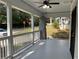 Front porch with white railings, stone columns, and street view at 916 Cascade Sw Rd, Atlanta, GA 30311