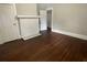 Spacious bedroom with hardwood floors and a fireplace at 916 Cascade Sw Rd, Atlanta, GA 30311