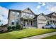 Two-story house with brick facade, columns, and attached garage at 3756 Wood Hollow Way, Snellville, GA 30039