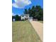 Two-story house with a well-maintained lawn and driveway at 500 Mica Trce, South Fulton, GA 30349