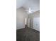 Spacious bedroom with ceiling fan, carpet, and double doors at 3008 Summer Breeze Dr, Villa Rica, GA 30180