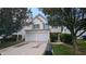 Two story home with double garage and mature landscaping at 3008 Summer Breeze Dr, Villa Rica, GA 30180
