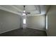Large bedroom with ceiling fan and neutral decor at 3008 Summer Breeze Dr, Villa Rica, GA 30180
