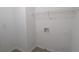 Functional laundry area with hookups and shelving at 3008 Summer Breeze Dr, Villa Rica, GA 30180