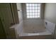 Relaxing bathroom with a large garden tub at 3008 Summer Breeze Dr, Villa Rica, GA 30180