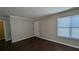 Bright living room with hardwood floors and neutral walls, offering ample natural light at 3008 Summer Breeze Dr, Villa Rica, GA 30180