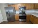 Modern kitchen with stainless steel appliances and granite countertops at 3008 Summer Breeze Dr, Villa Rica, GA 30180