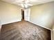 Bright bedroom with ceiling fan and carpet flooring at 1321 Webb Farm Ln, Loganville, GA 30052