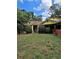 Two story yellow house with a front door and landscaping at 678 Quillian Ave, Decatur, GA 30032